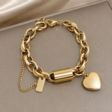 Pulsera ancha dorada con corazón