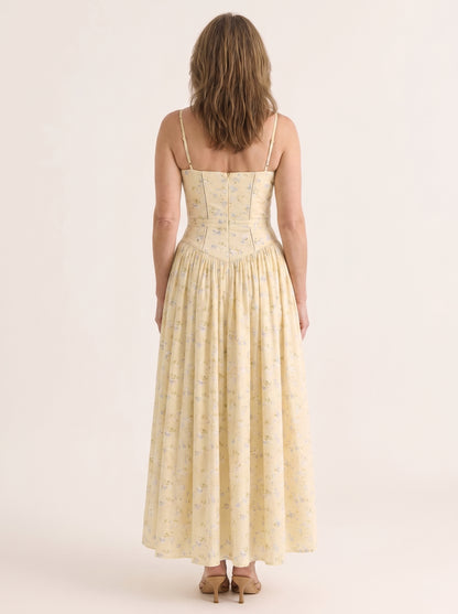 Detalle de la cintura y el corsé del vestido vintage amarillo de fiesta