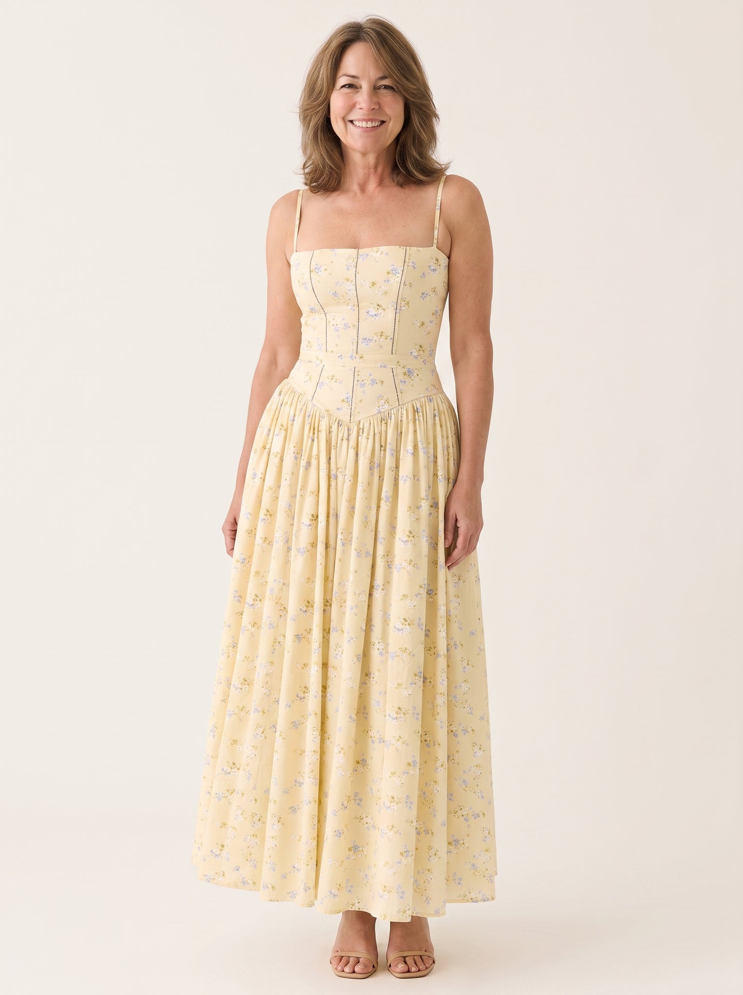 Vestido vintage amarillo de fiesta con corsé y estampado floral azul, de cuerpo entero