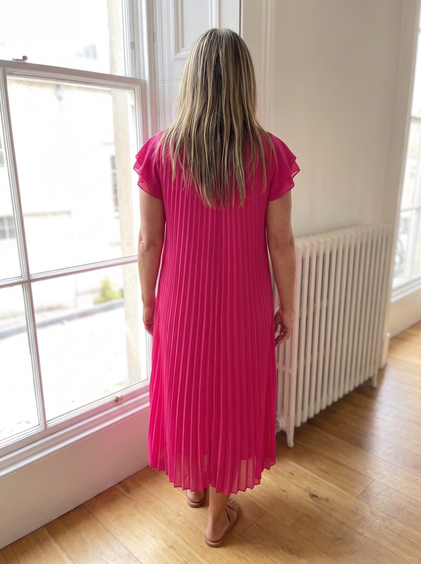 Vestido Seraphina en rosa visto de espalda