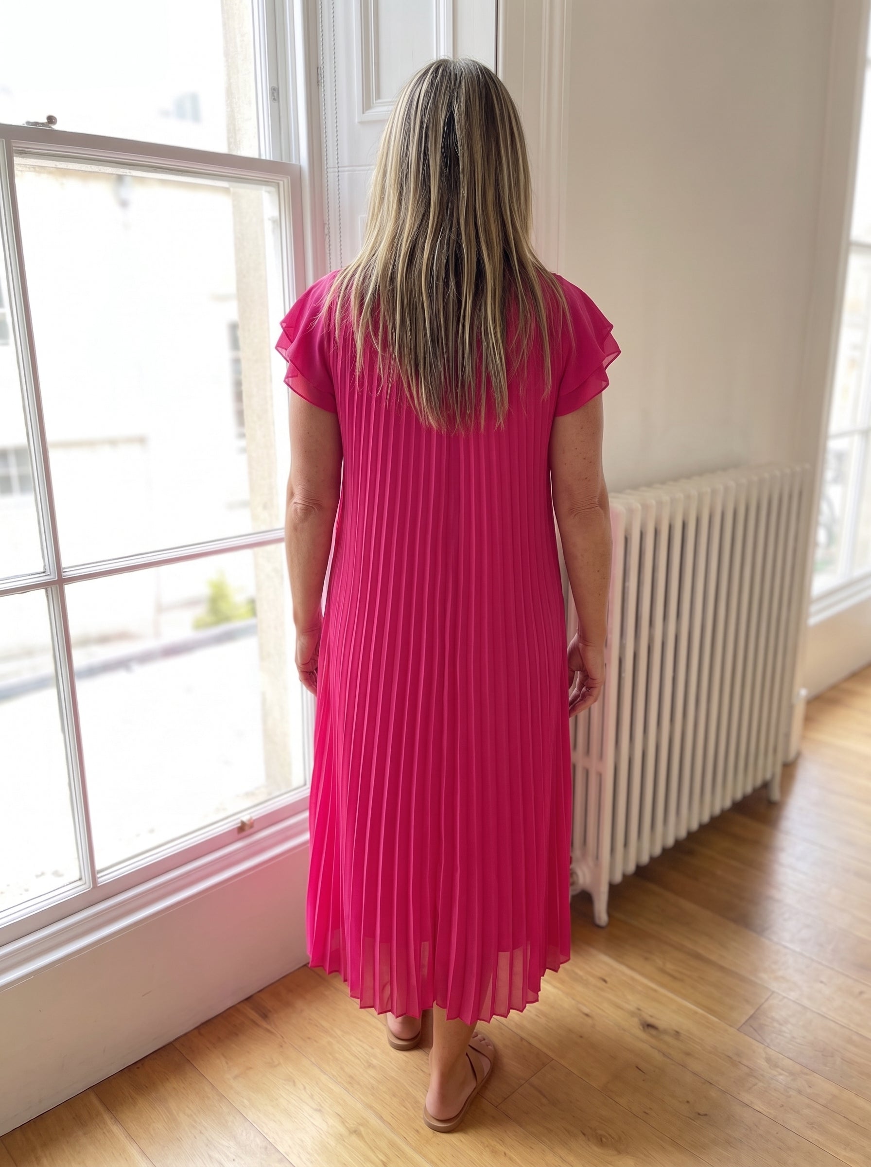 Vestido Seraphina en rosa visto de espalda